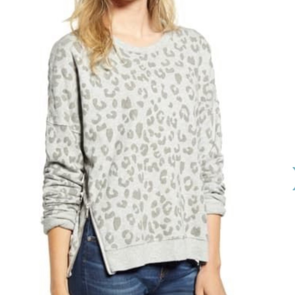 Sweater with zipper sides